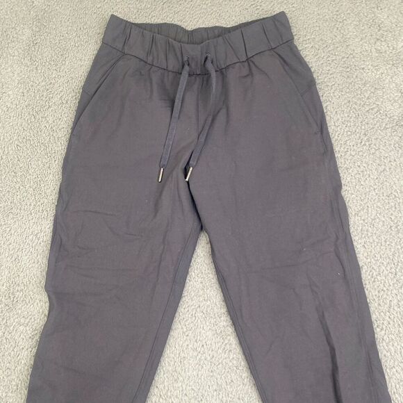 Lululemon On The Fly Jogger Pants Black Size 2 Drawstring Logo LW5cpjs - Picture 2 of 9